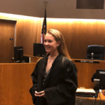 blonde girl in judge's robe