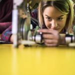 girl building a robot