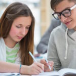 High School students. Girl and boy study together